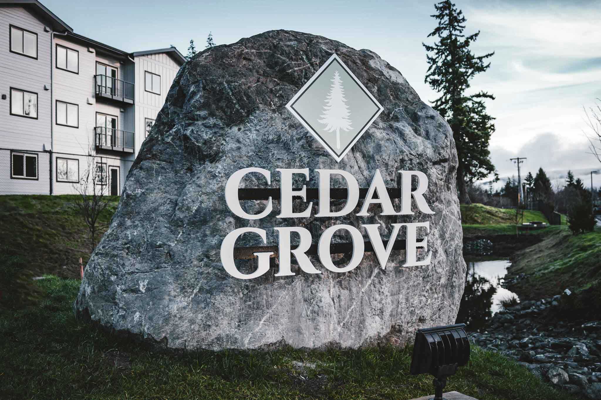 development-cedar-grove-apartments-rock-sign