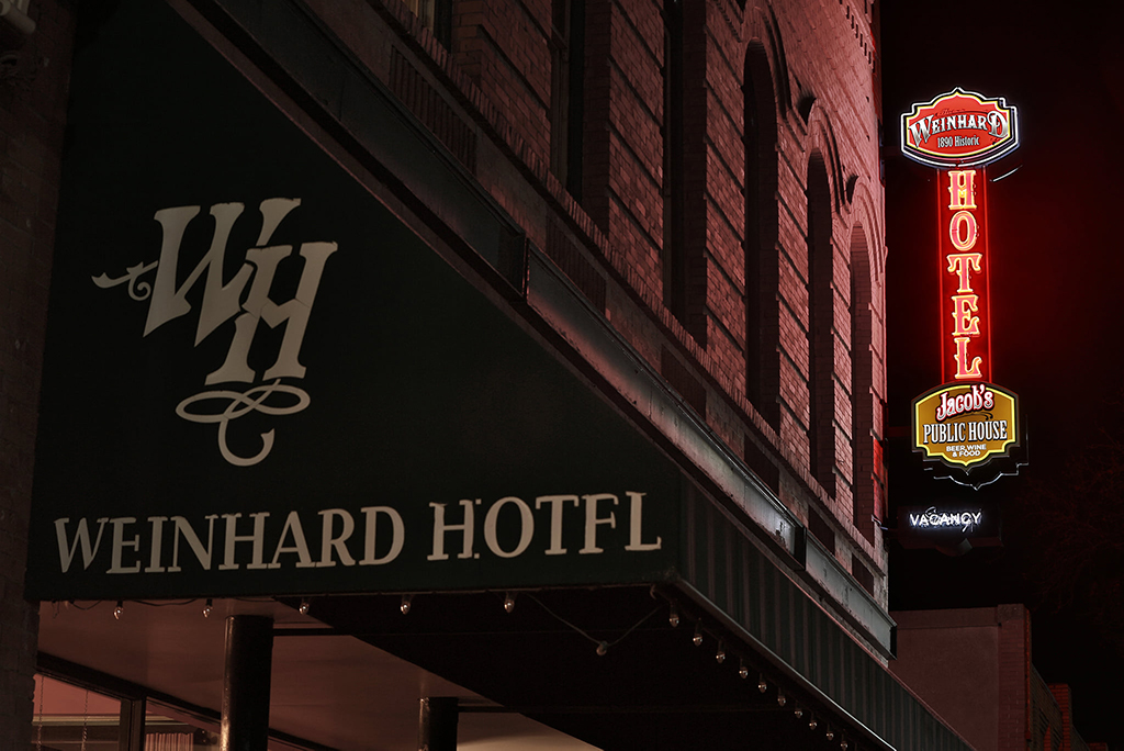 Featured Image - Weinhard Hotel Lit at Night