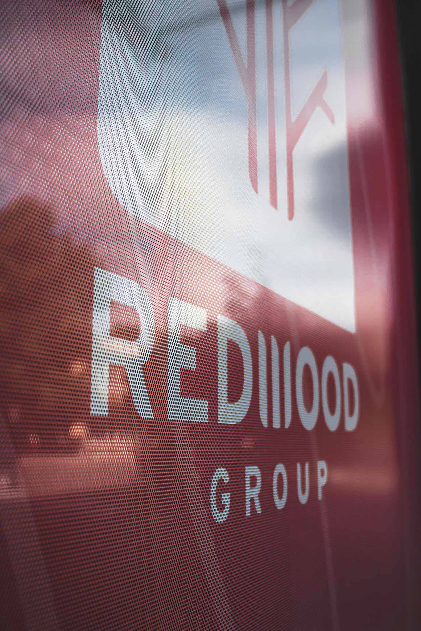 development-redwood-group-exp-realty-preforated-privacy-vinyl-closeup